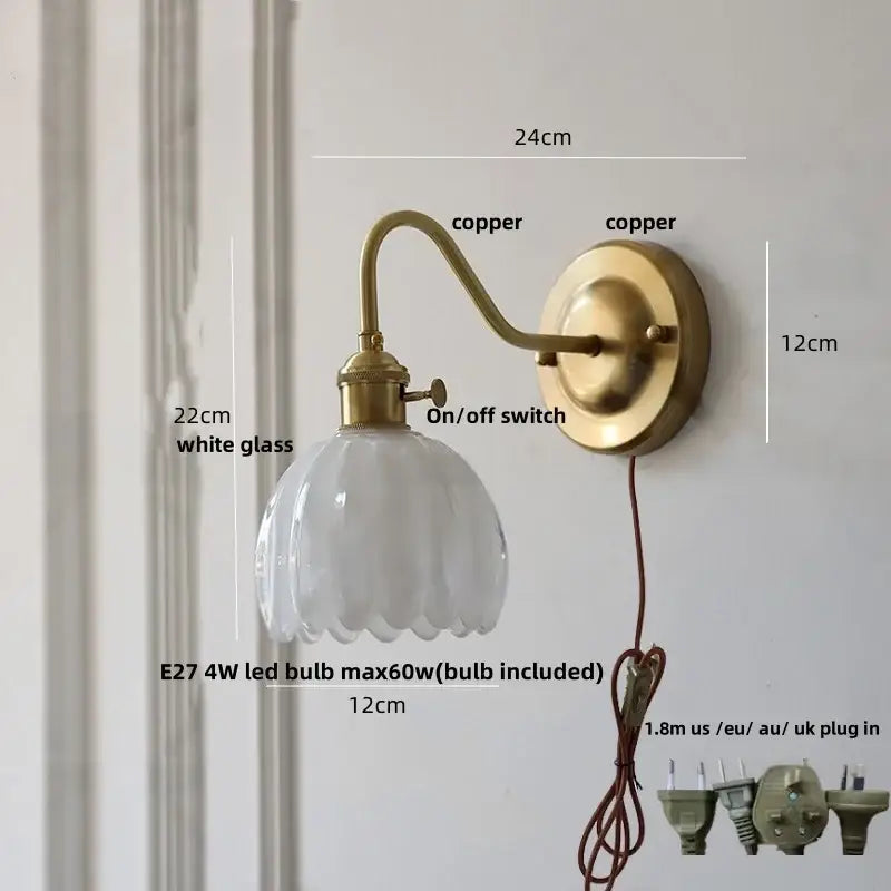 Brass-finished wall sconce with white scalloped glass shade, e27 led bulb, and glass copper knob switch