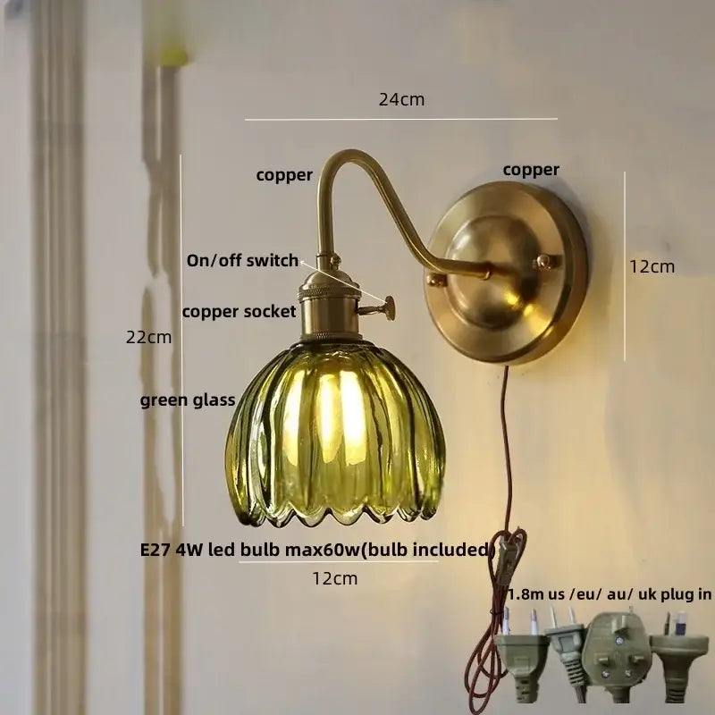 Vintage-style wall sconce with ribbed green glass shade and glass copper knob switch for modern bedroom lighting