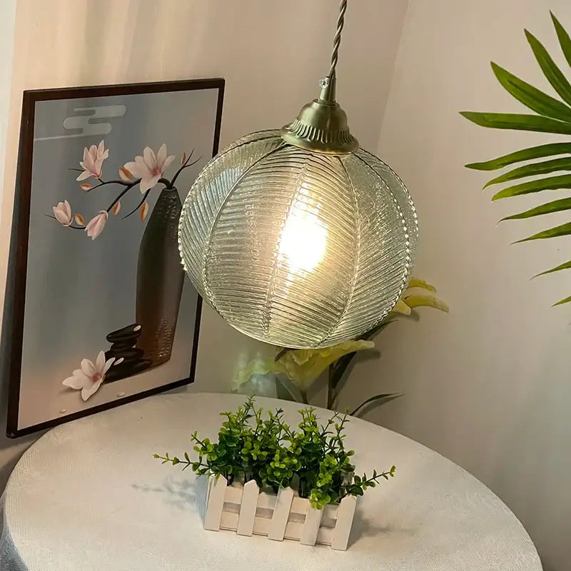 Modern ribbed blue glass led pendant lamp with brass metal top and twisted cord for dining room lighting decorbites blue glass