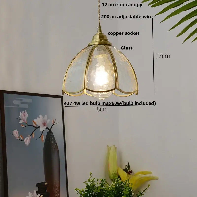 Modern ribbed blue glass led pendant light with brass-toned flower-shaped textured shade and adjustable copper socket for decorbites blue glass decor
