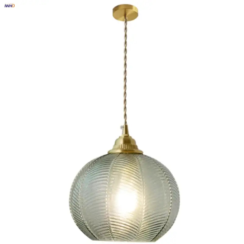 Modern ribbed blue glass led pendant light with translucent spherical design and brass metal hardware by decorbites