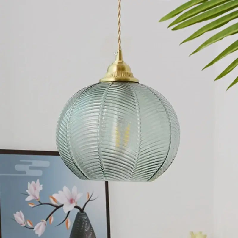 Modern ribbed blue glass led pendant light with light blue glass and brass-finished top for kitchen decorbites pendant light