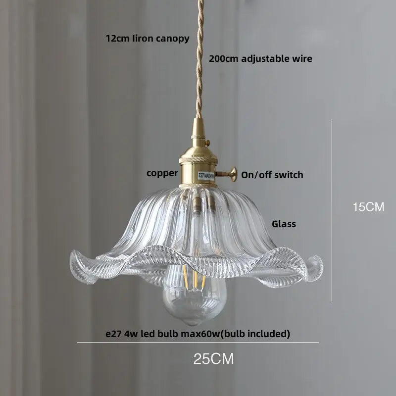 Modern ribbed clear glass led pendant light with brass-finished copper fixture and adjustable wire suspension for decorbites clear glass decor