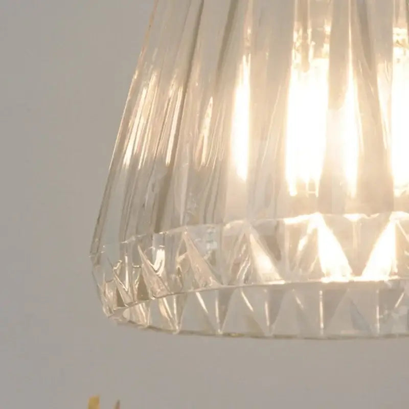 Modern ribbed clear glass led pendant light with conical faceted glass lampshade and intricate cut patterns decorbites clear glass
