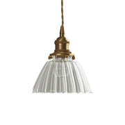 Modern ribbed clear glass pendant light with a brass fixture and twisted cord decorbites clear glass nordic style