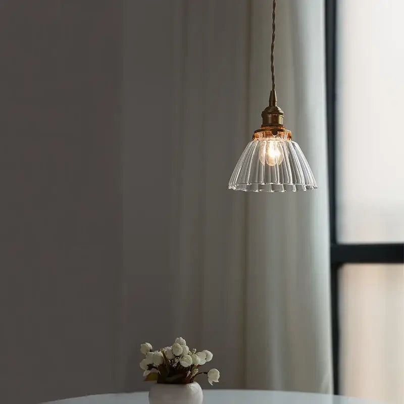 Modern ribbed clear glass pendant light with brass fixture and cord featuring decorbites clear glass nordic design