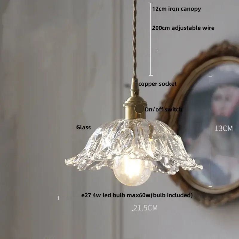 Modern ribbed clear glass pendant light with fluted petal design and brass hardware by decorbites clear glass decor