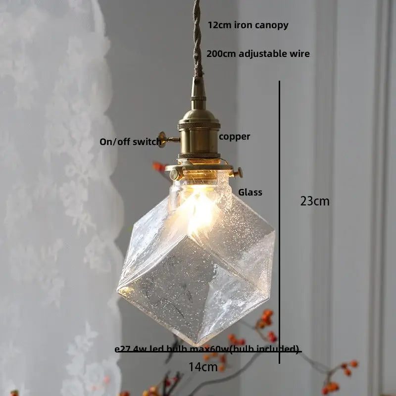 Modern ribbed clear glass pendant light with warm glow brass fixture and adjustable iron canopy by decorbites clear glass