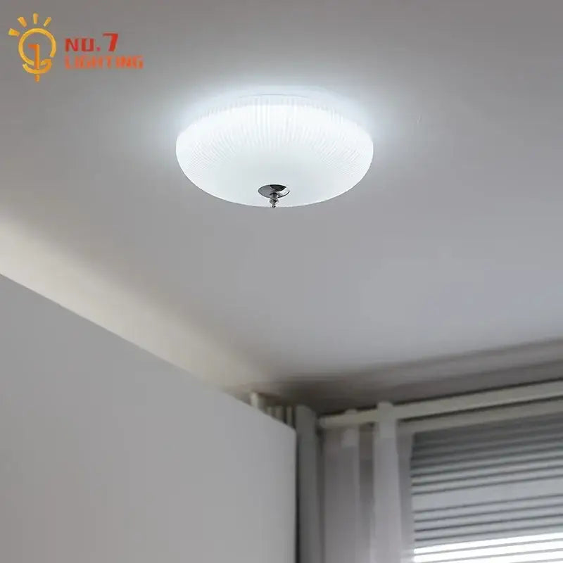 Modern cream glass round ceiling lights with white frosted glass and sleek chrome fixture for bedroom decorbites decor