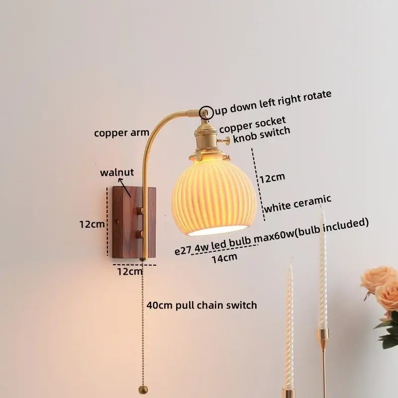 A warm-toned white ribbed ceramic wall light with a copper arm and walnut mounting plate for decorbites ceramic walnut led