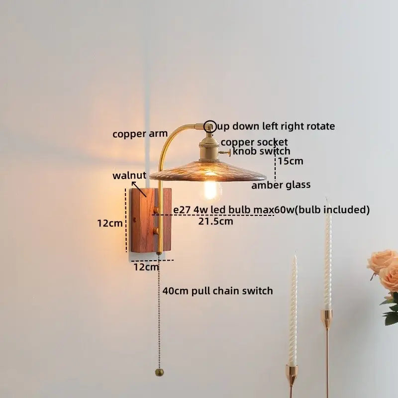 A warm-toned modern ribbed glass wall light with copper arm and ceramic walnut led base for bedroom decorbites
