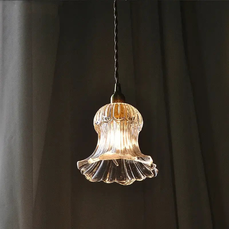 Modern ribbed glass brass led pendant light with clear ribbed glass and dark twisted cord for dining room decorbites brass led