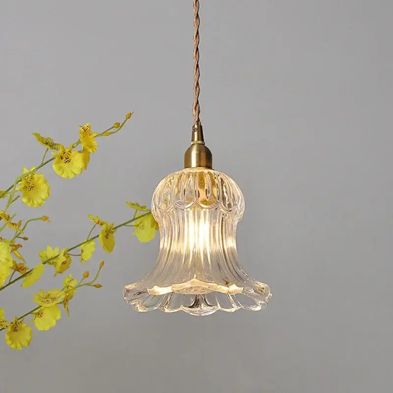 Clear glass ribbed bell-shaped pendant light with brass led fixture ideal for modern dining room decorbites brass led