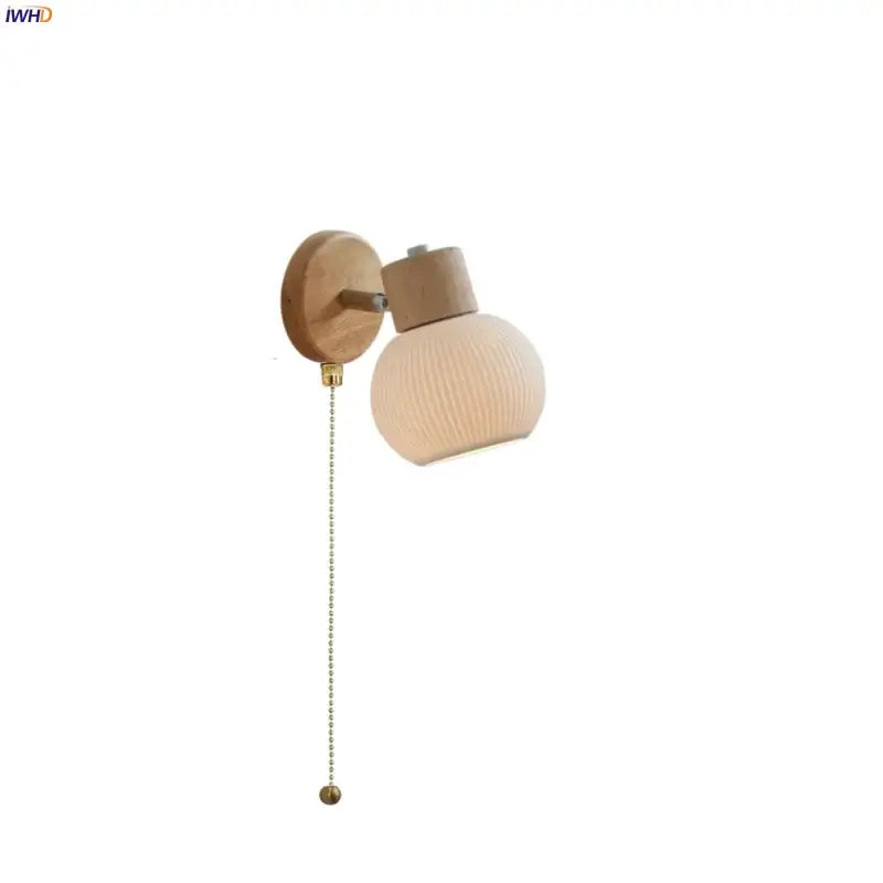 Modern ribbed glass ceramic led wall lights with warm-toned globe, wooden base, and brass pull chain decorbites ceramic led lamp