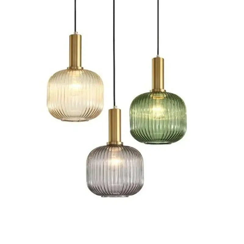 Three modern light chandeliers with amber green and gray ribbed glass colorful led pendants and brass stems