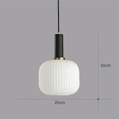 Modern ribbed glass colorful led pendant light chandelier with white glass, black stem, and gold accents for dining room