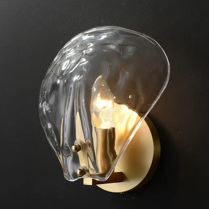 Modern ribbed glass copper led wall lamp with translucent textured shell and warm brass base for bedroom decor