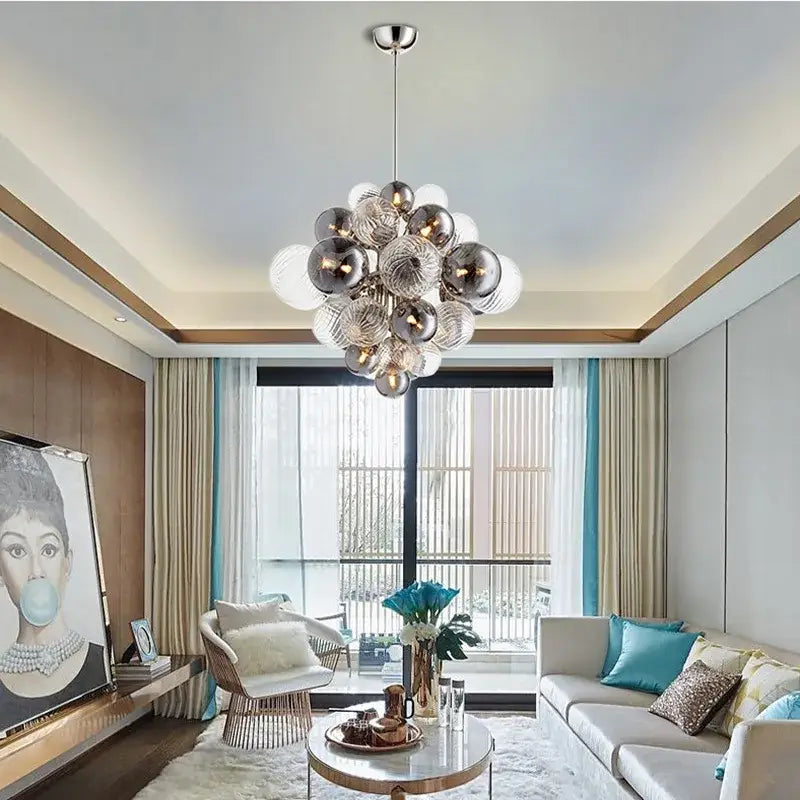 Modern spherical pendant light with reflective metallic and frosted glass orbs by decorbites glass globe led design