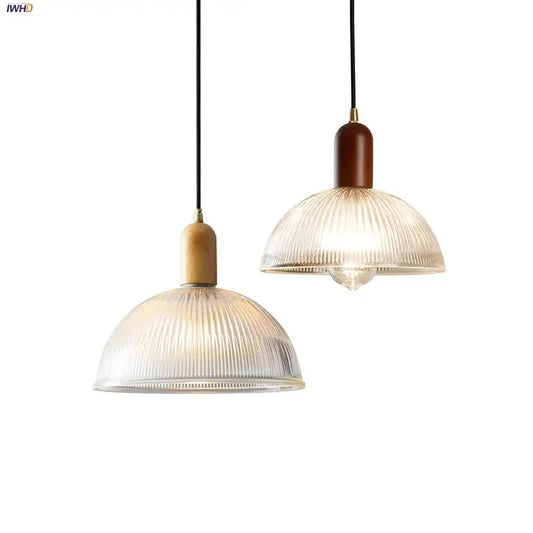 Two pendant lights with ribbed translucent glass led pendant shades and wood brass cylindrical fixtures for kitchen chandelier