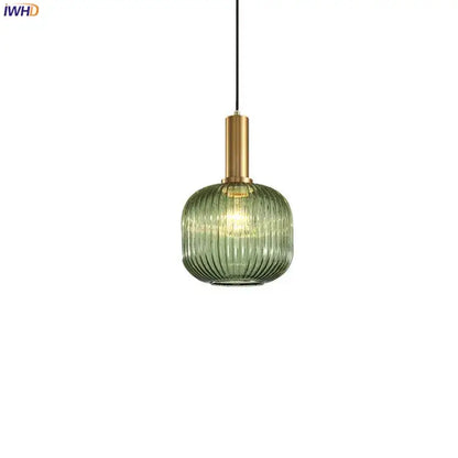 Modern green ribbed glass pendant light with brass stem ideal for dining room glass pendant lights