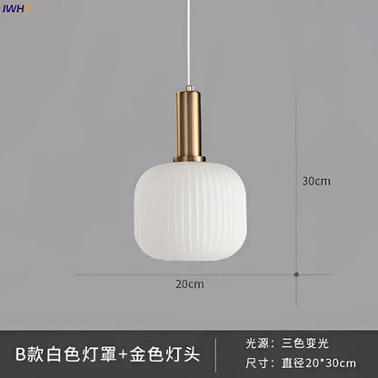 Modern white ribbed glass pendant light with gold-toned brass stem for dining room glass pendant lights