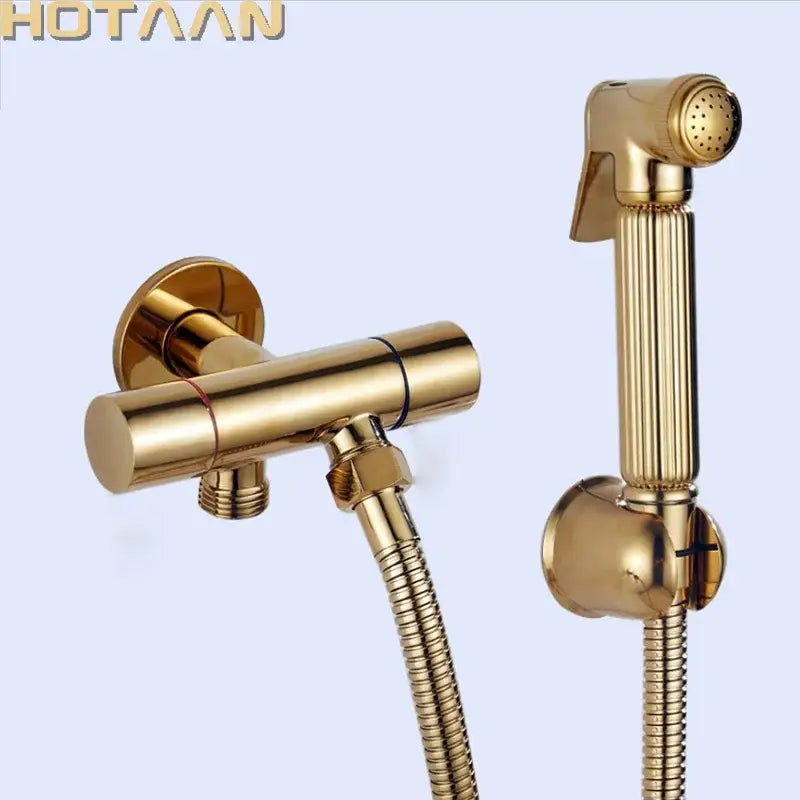 Modern ribbed gold brass bidet sprayer set with sleek handheld sprayer and matching wall-mounted valve for bathroom hygiene