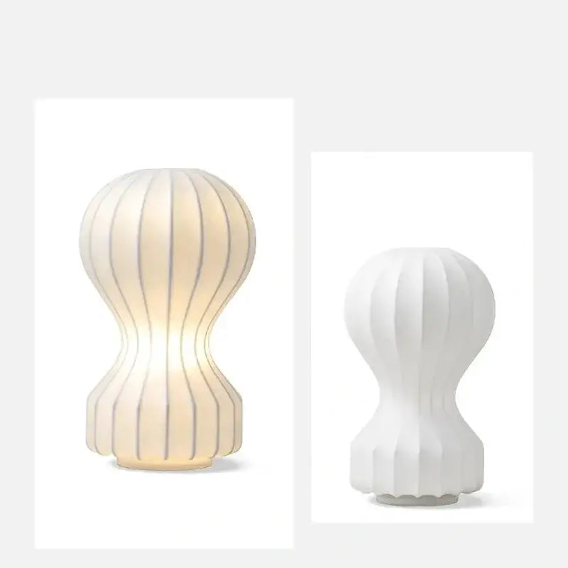 Modern ribbed white ceramic silk table lamp with soft warm glow ideal as a bedroom led table lamp