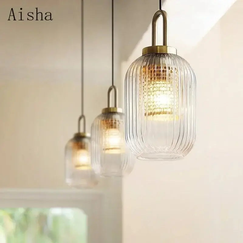 Modern ridged clear glass pendant lamp with vertical ridges and brass finish metal top for bedroom decorbites clear glass lighting