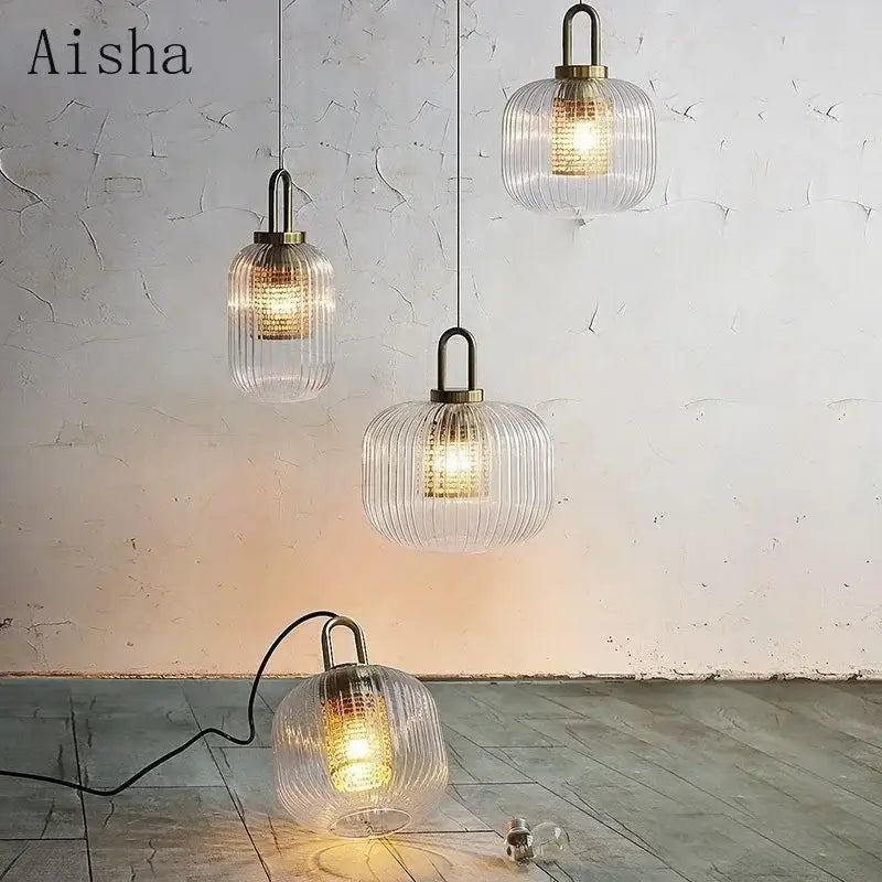 Modern ridged clear glass pendant lamp with brass accents and warm glow for bedroom decorbites clear glass lighting