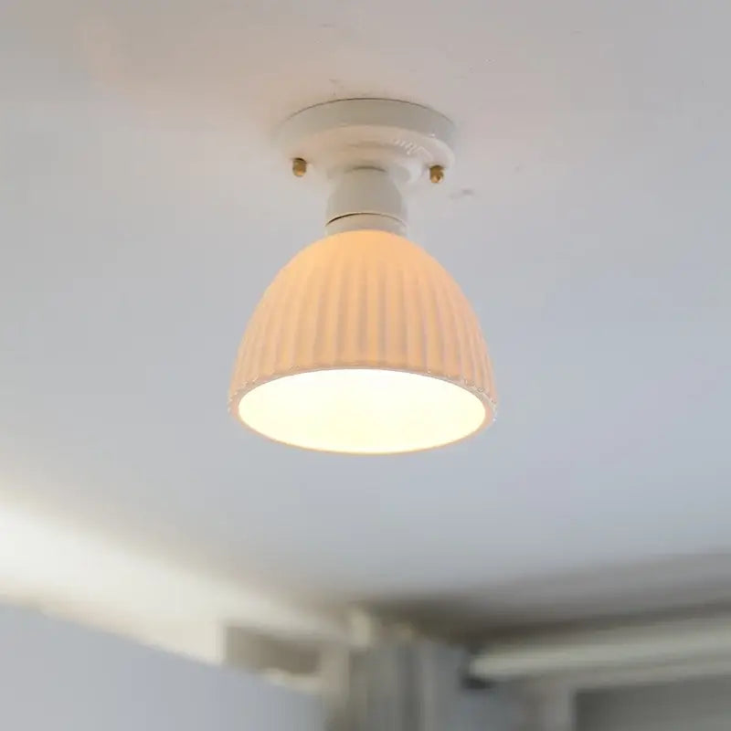 Modern ridged cream ceramic led ceiling light with vertical ridges and white mounting base for living room decorbites ceramic led