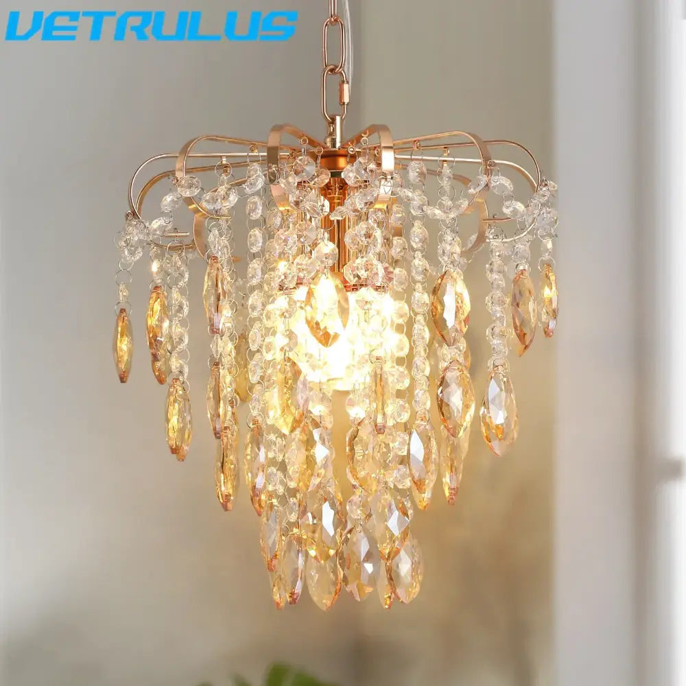 Modern rose gold pendant light with amber and clear crystal led droplets by decorbites for elegant living room decor