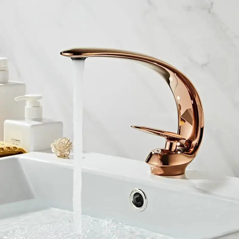 Modern rose gold basin faucet with single handle curved spout and polished finish by decorbites basin faucet