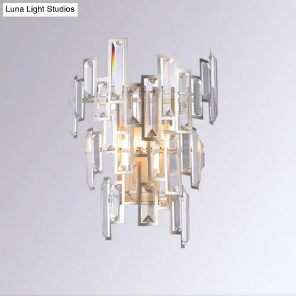 Modern rose gold wall lamp with geometric crystal sconce and polished chrome frame for dining room lighting