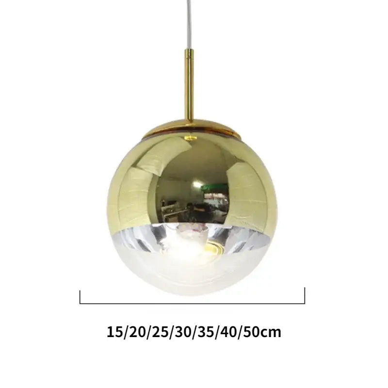 Modern rose gold glass ball pendant light with mirrored globe and brass hardware from decorbites pendant lights