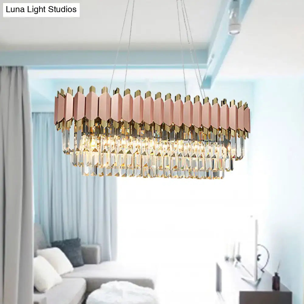 DecorBites™ traditional gold oval dining room light fixture with a modern rectangular rose gold frame and clear crystal prisms