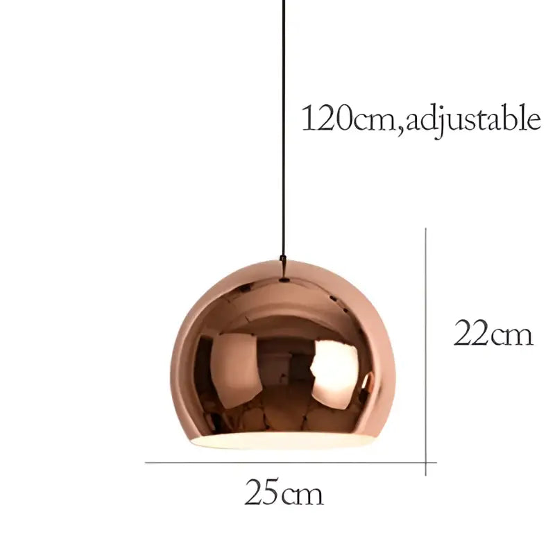 A sleek rose gold pendant light with a polished metallic dome design for dining room island decor by decorbites rose gold