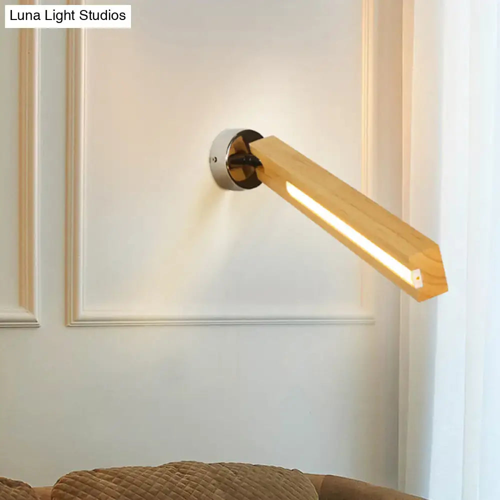 Modern rotatable beige wood wall light with sleek angular design and warm led lighting inch fixture for bedroom use