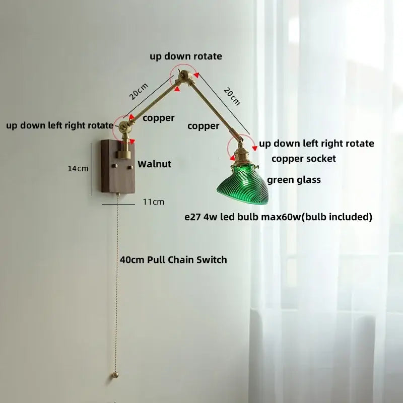 Adjustable copper wall light fixture with green glass shade and walnut-finished mounting plate for modern interiors