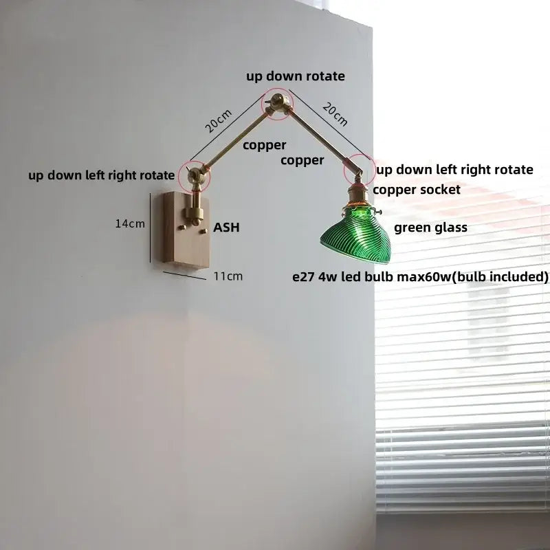 Adjustable copper wall light fixture with green glass shade and rotatable brass design for modern stair lighting