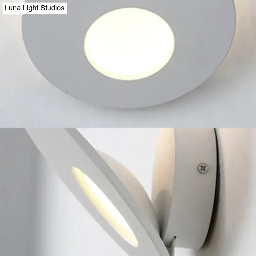 White circular wall lamp with integrated led and round acrylic design for modern bedroom lighting in black and white