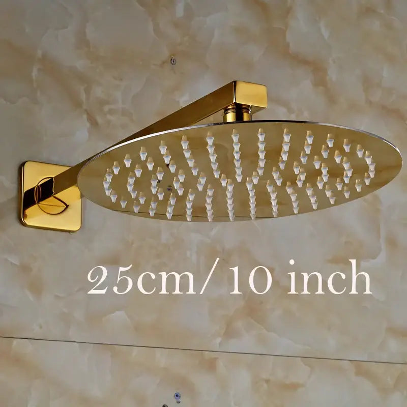 Modern round gold ultrathin rainfall shower head set with sleek metallic finish and multiple water nozzles for bathroom use