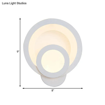 Modern round white led wall light with layered circular design and warm white glow 8 inch fixture for stairway use