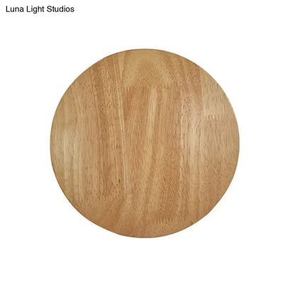 Modern round wood led wall lighting light fixture with light brown circular wooden disc and natural grain patterns for living room
