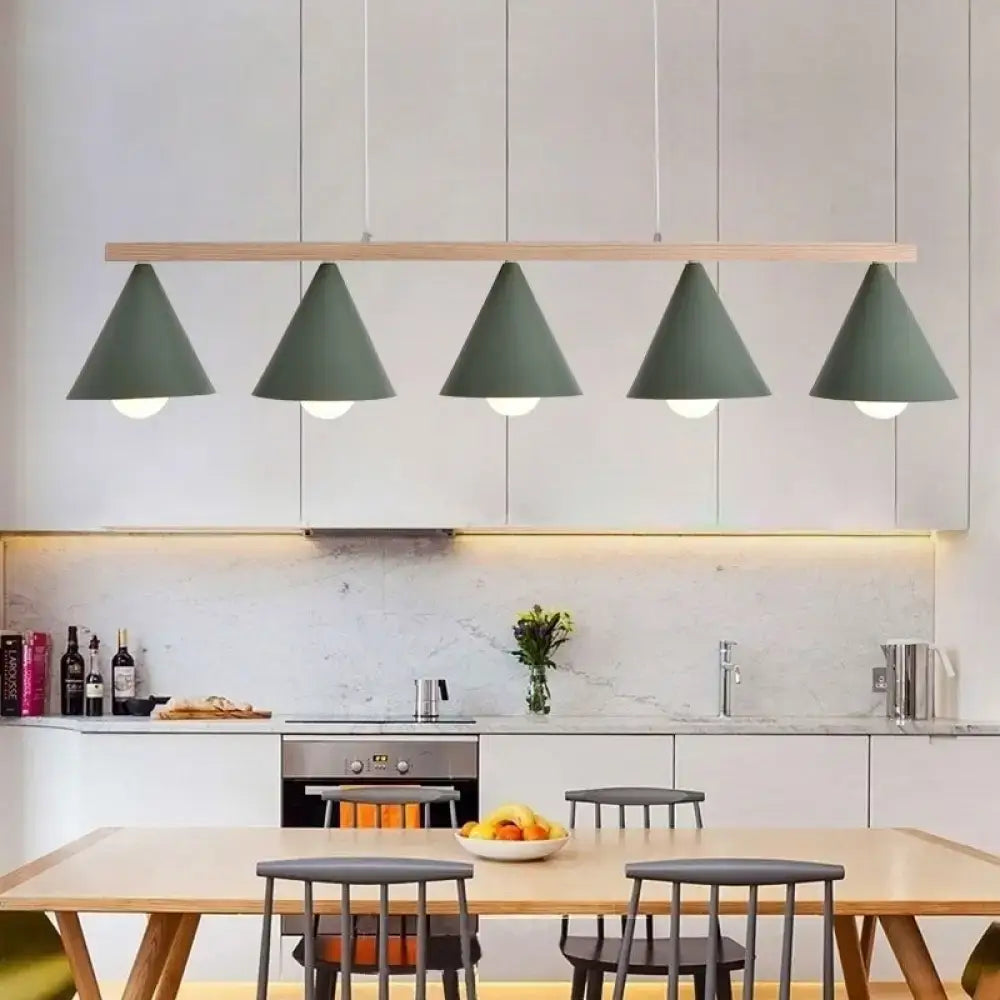 Modern matte sage green iron island pendant ceiling light with conical shades suspended from light wood bar