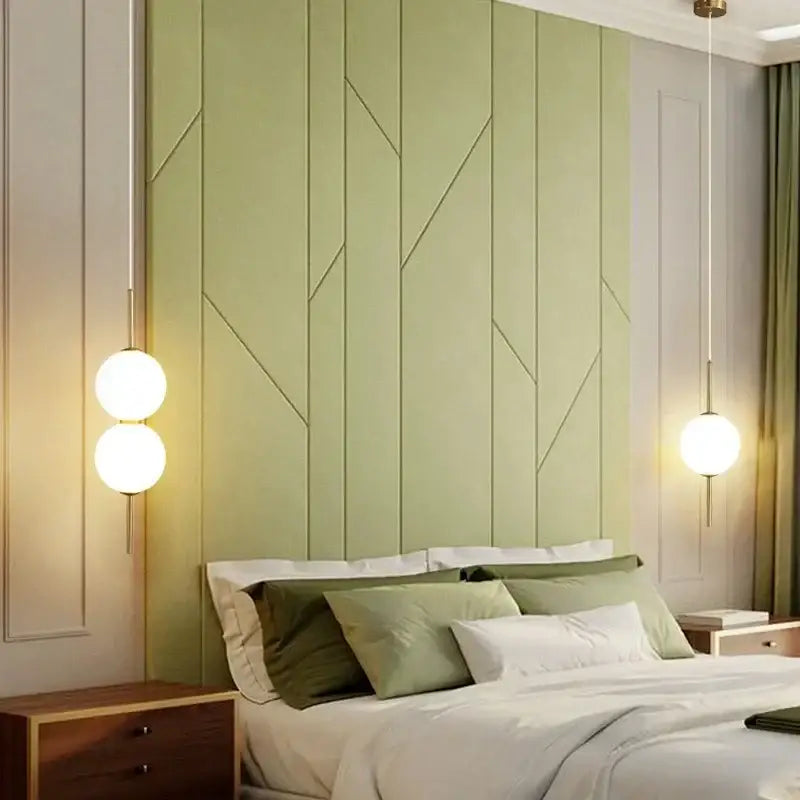 Modern sage green glass ball led pendant lamps with geometric accent wall featuring vertical paneling for living room decorbites glass ball