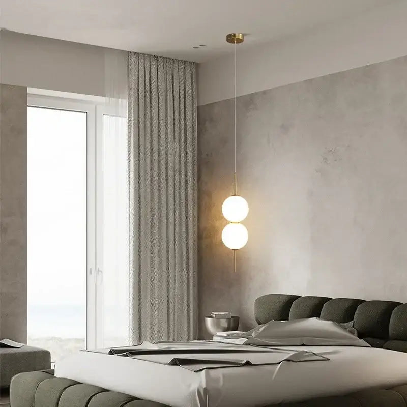 Modern sage green pendant lamps with two glass ball led bulbs suspended by gold-toned chain for living room decorbites glass ball