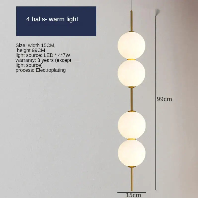 Modern sage green glass ball led pendant lamps with four frosted glass bulbs on a slender gold-toned frame for living room decor