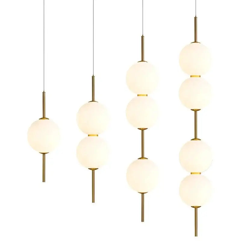 Modern sage green glass ball led pendant lamps with frosted spheres and brass accents for living room decorbites pendant lamps