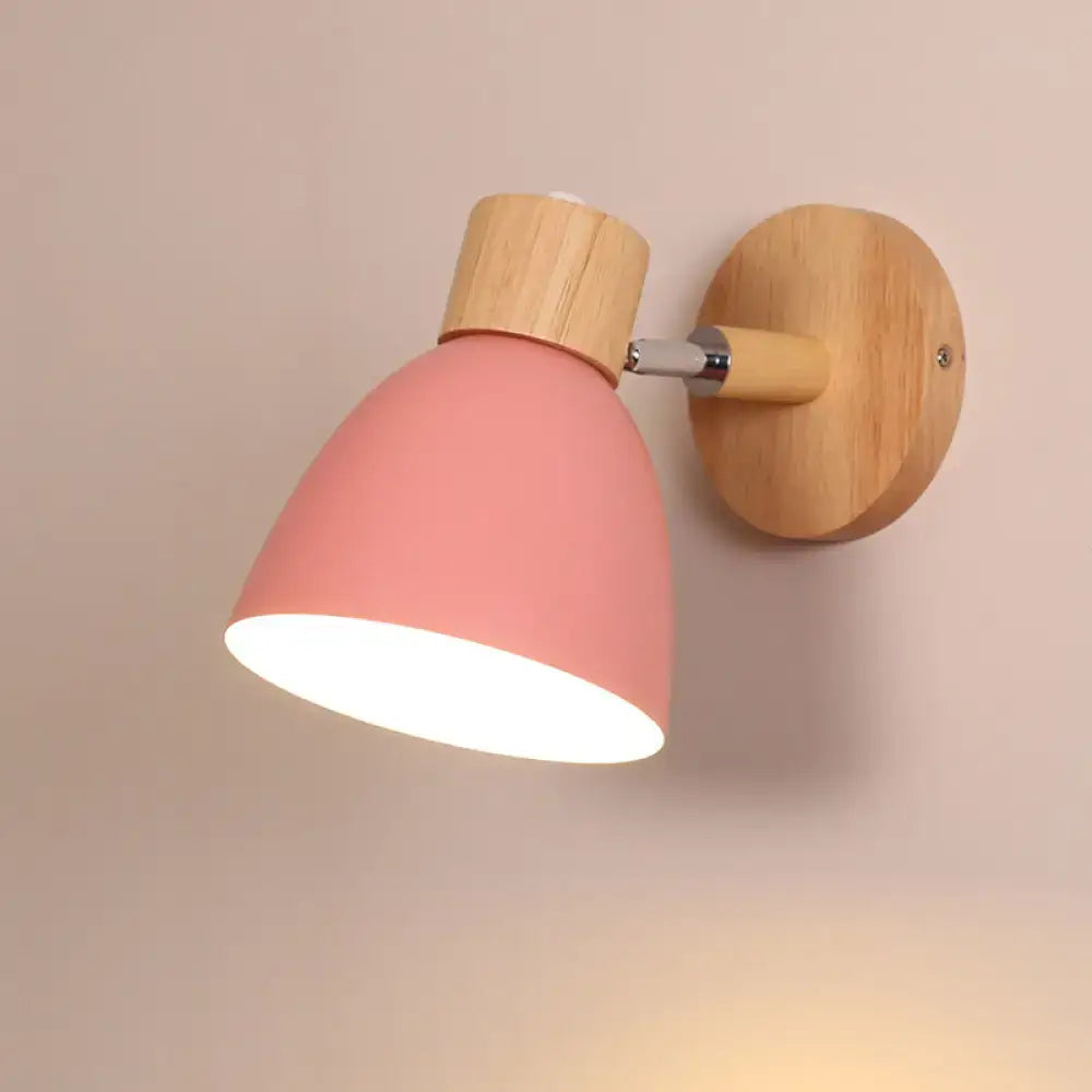 Modern sage green macaron wood wall light fixture featuring a pink matte wall light with natural wood base and adjustable arm for corridor use