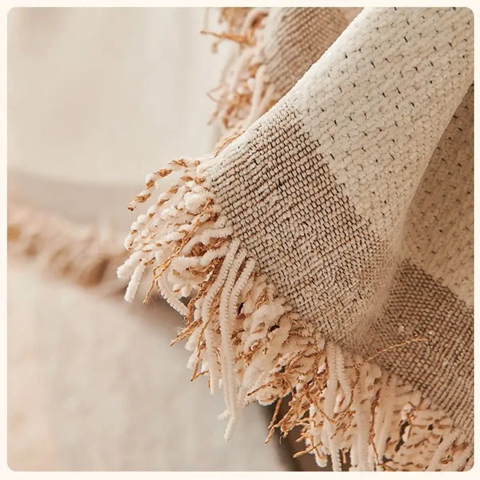 Beige and cream woven throw with textured fringe detail as a thicken chenille sofa cover sofa for living room use